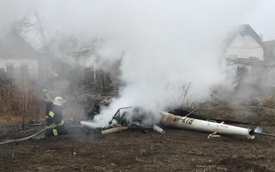 Падение вертолета "Робинсон-44" Фото: Госслужба Украины по ЧС